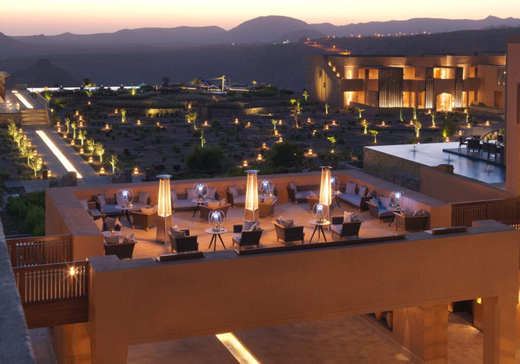 Elegant outdoor lounge at sunset.