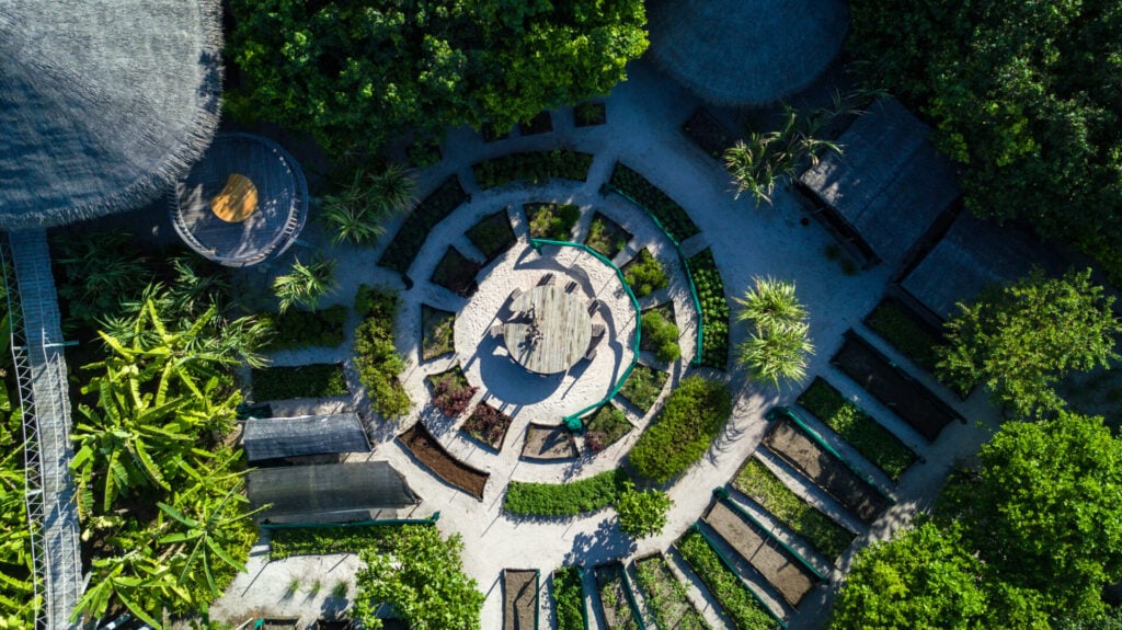 Aerial view of a circular garden at a Six Senses property