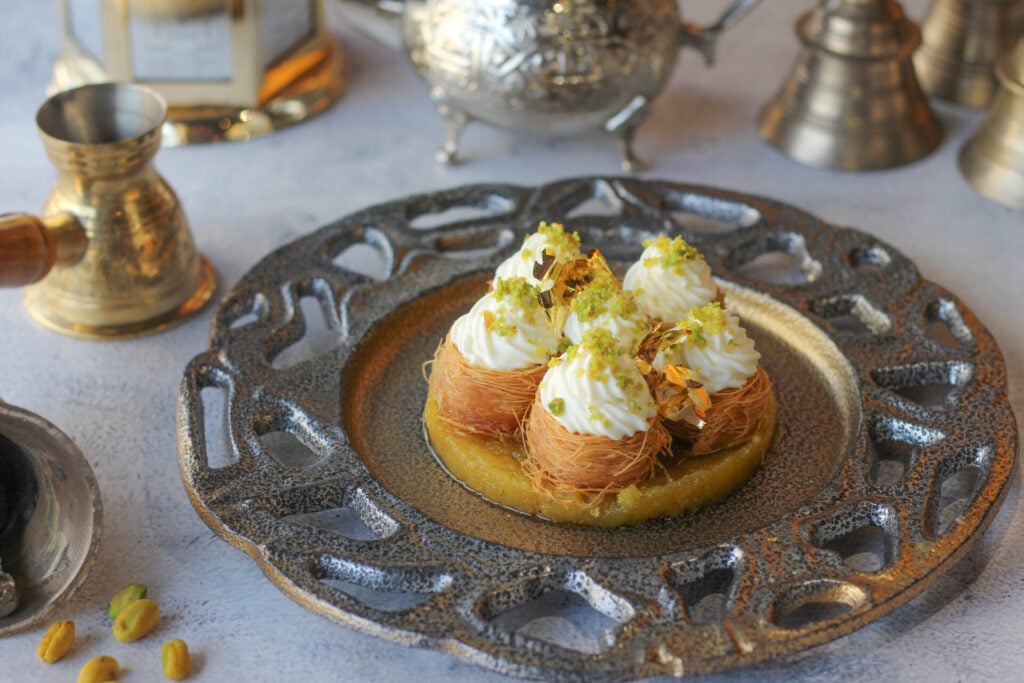 Dessert with pistachios and cream