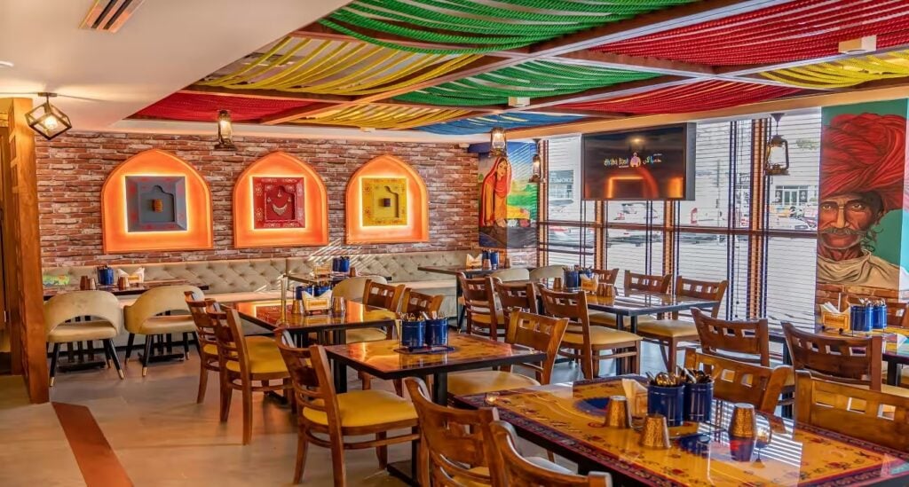 Colorful restaurant interior with tables.