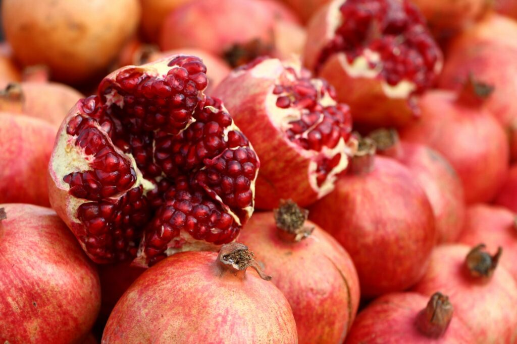 Pomegranates with vibrant red seeds