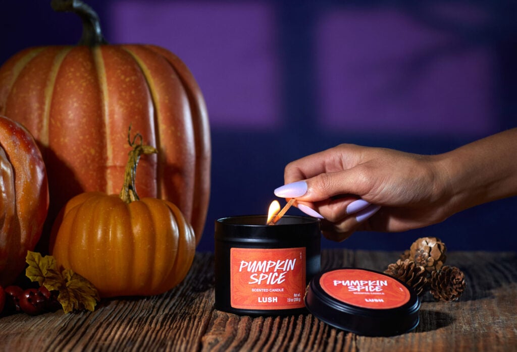 Lush Pumpkin Spice candle being lit
