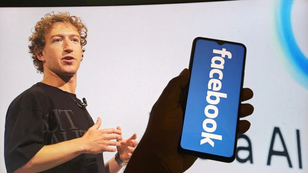 Person presenting with Facebook logo displayed.