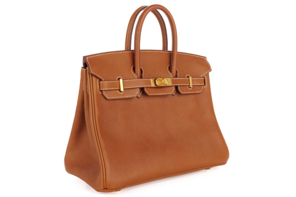 Elegant brown leather handbag with gold hardware