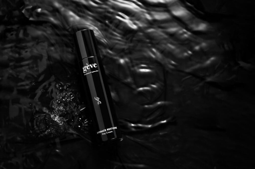 Black bottle on water surface