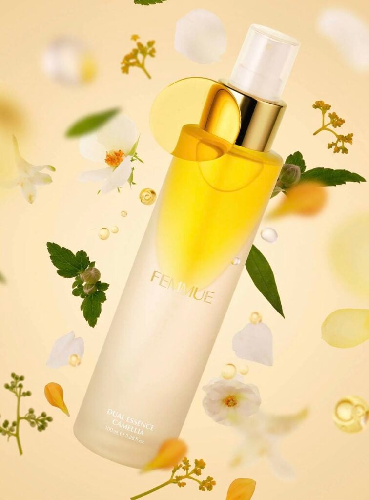 Elegant skincare bottle with floral background for a festive glow