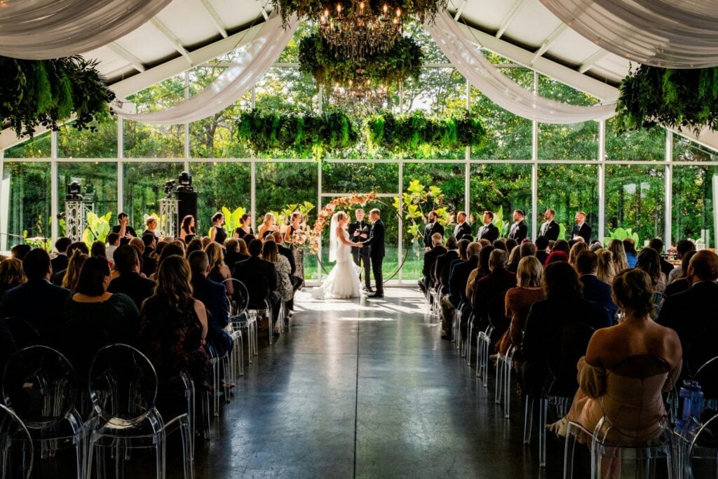 Wedding ceremony in a glass venue