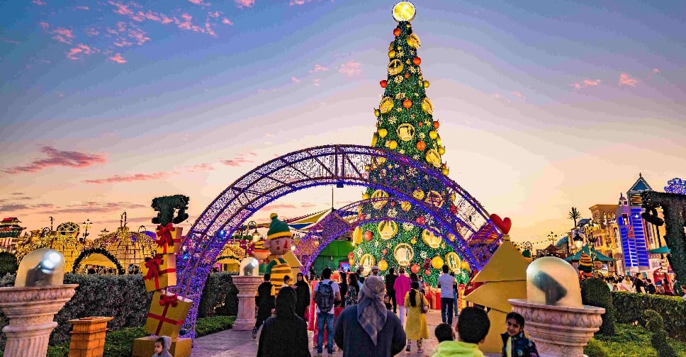 Colorful Christmas tree at sunset