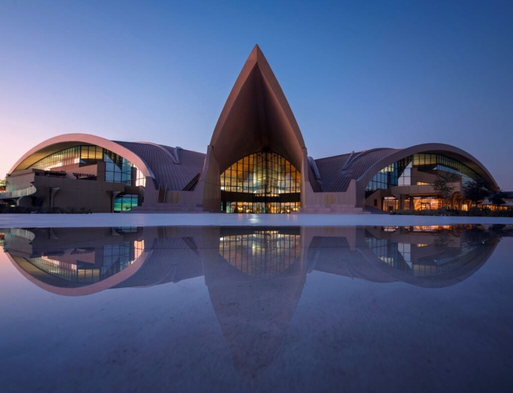 Modern architecture reflecting at dusk