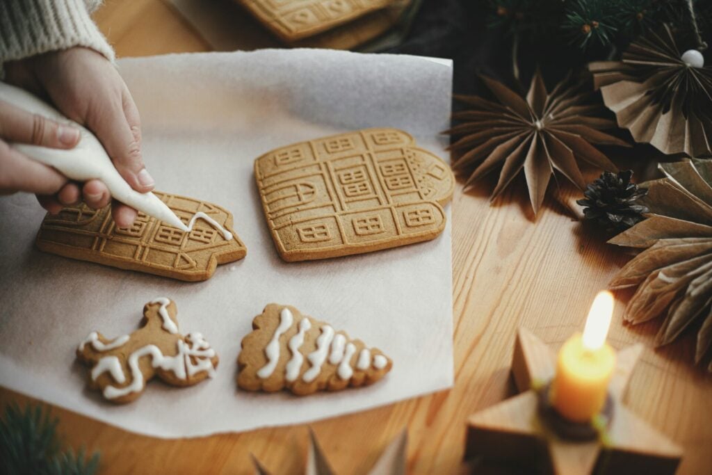 Decorating gingerbread cookies for Christmas
