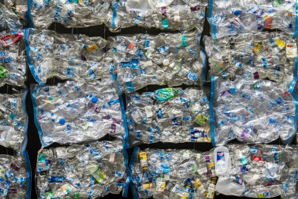 Bales of compressed plastic waste