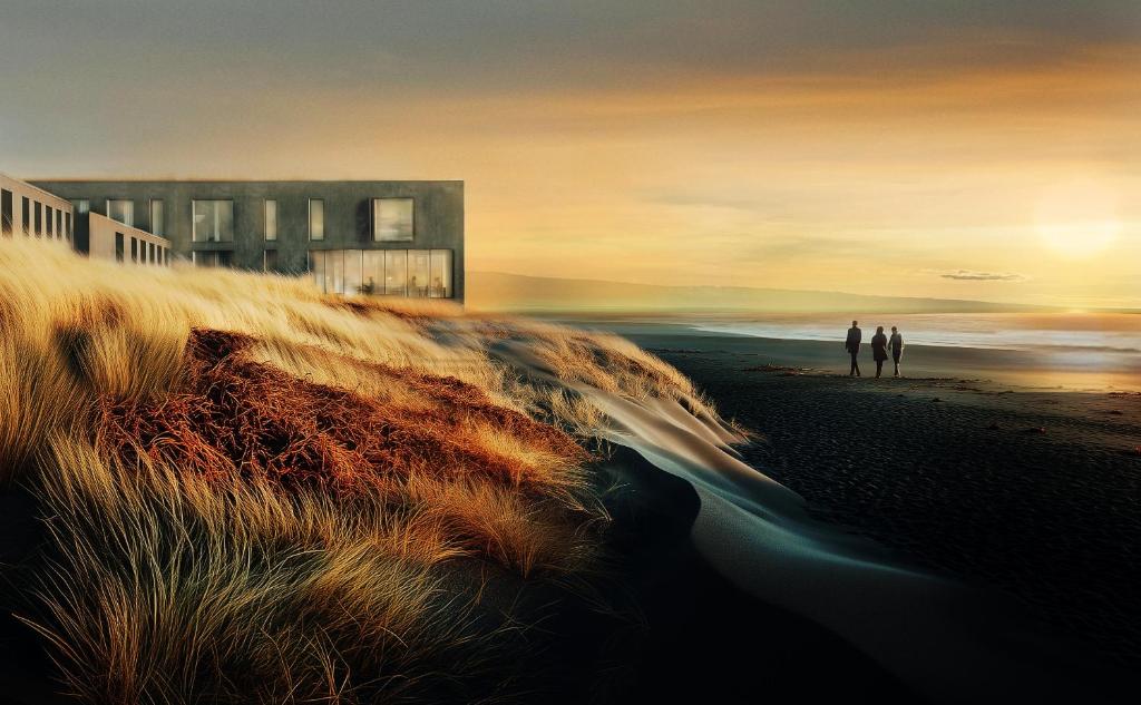 hotel on icelandic landscape at sunset 