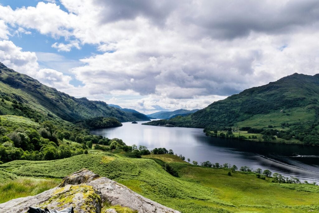 Scottish landscape with sweeping hills and a large river 