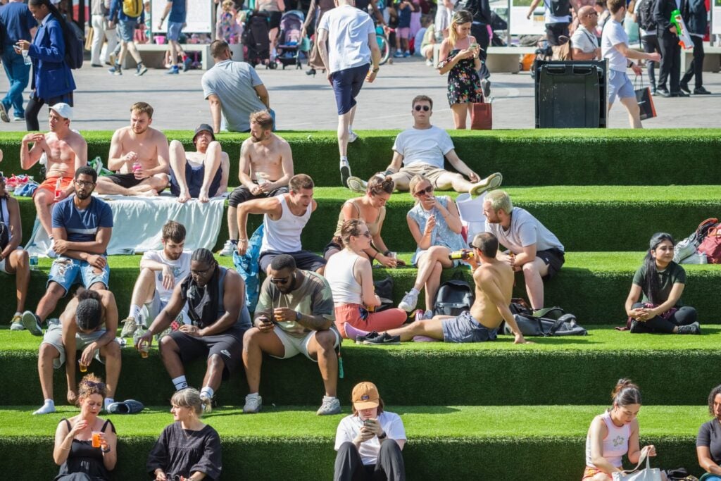 People lying in the sun during one of the UK's hottest years on record