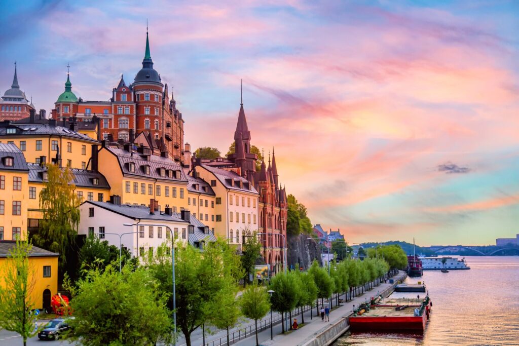 Stockholm at sunrise with street next to the water (one of Europe's most walkable cities)