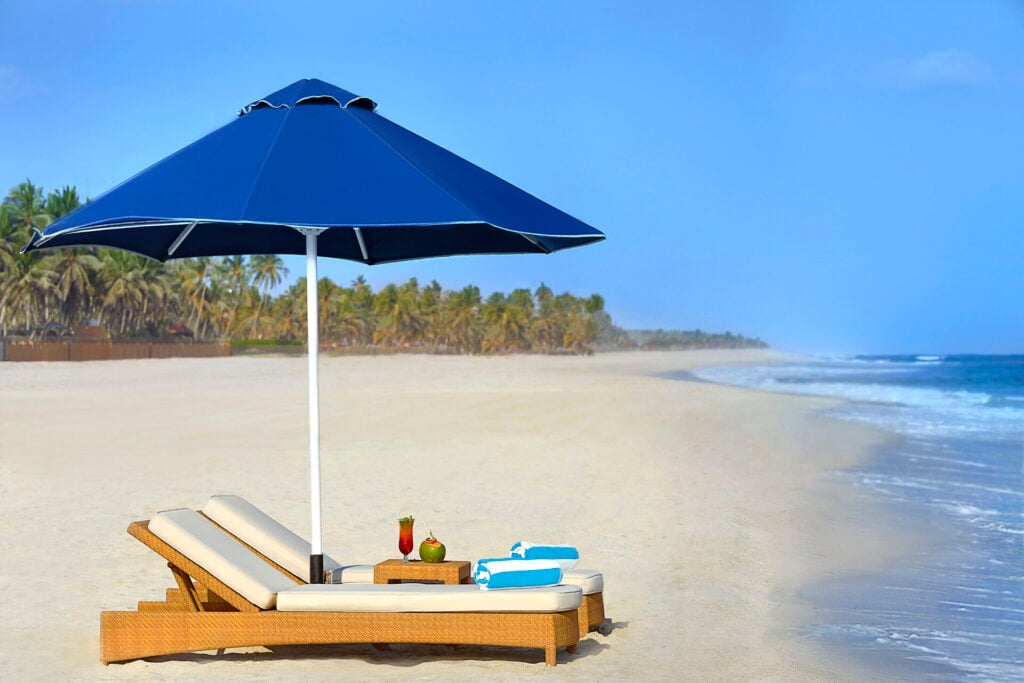 the beach with a wild coastline at Anantara Al Baleed Salalah Resort