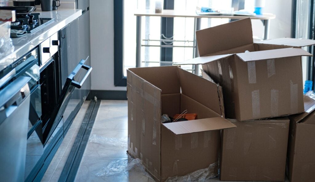 untidy boxes in kitchen