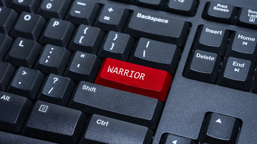 keyboard with one button in red called WARRIOR