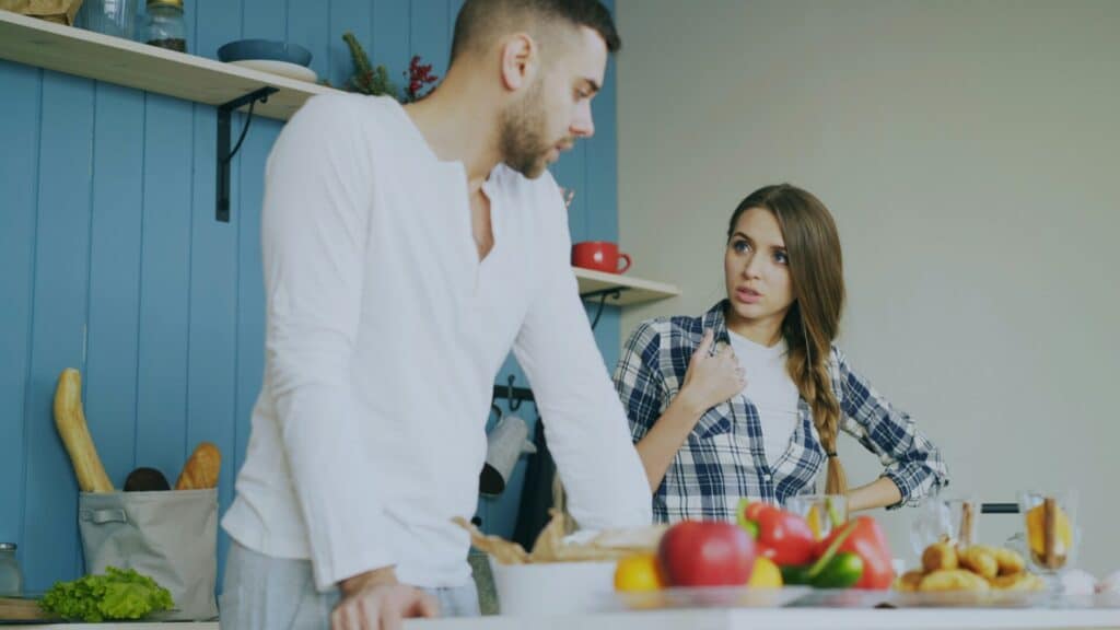 Standoff between a couple in the kitchen 