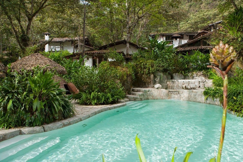 Tropical eco pool surrounded by lush greenery