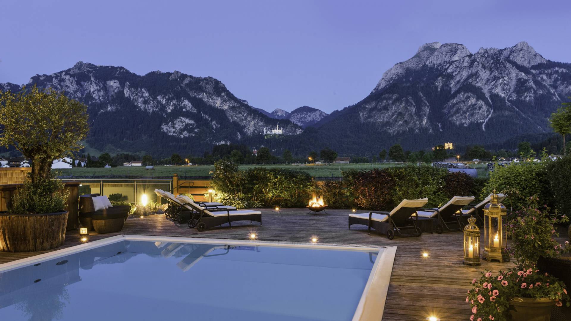 Serene poolside view with mountains