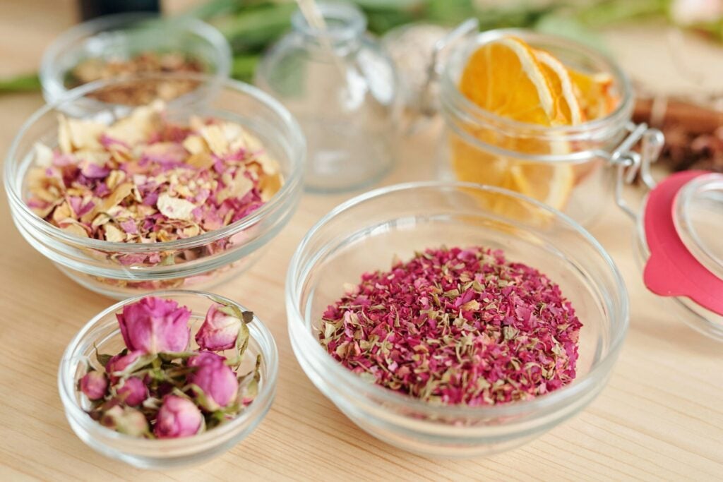 Dried ingredients in bowls for perfumes 