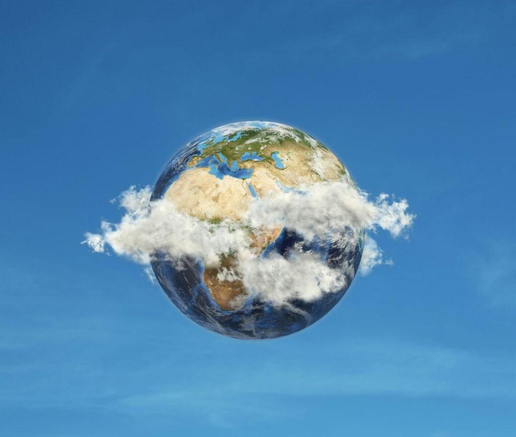 planet earth with clouds around it 