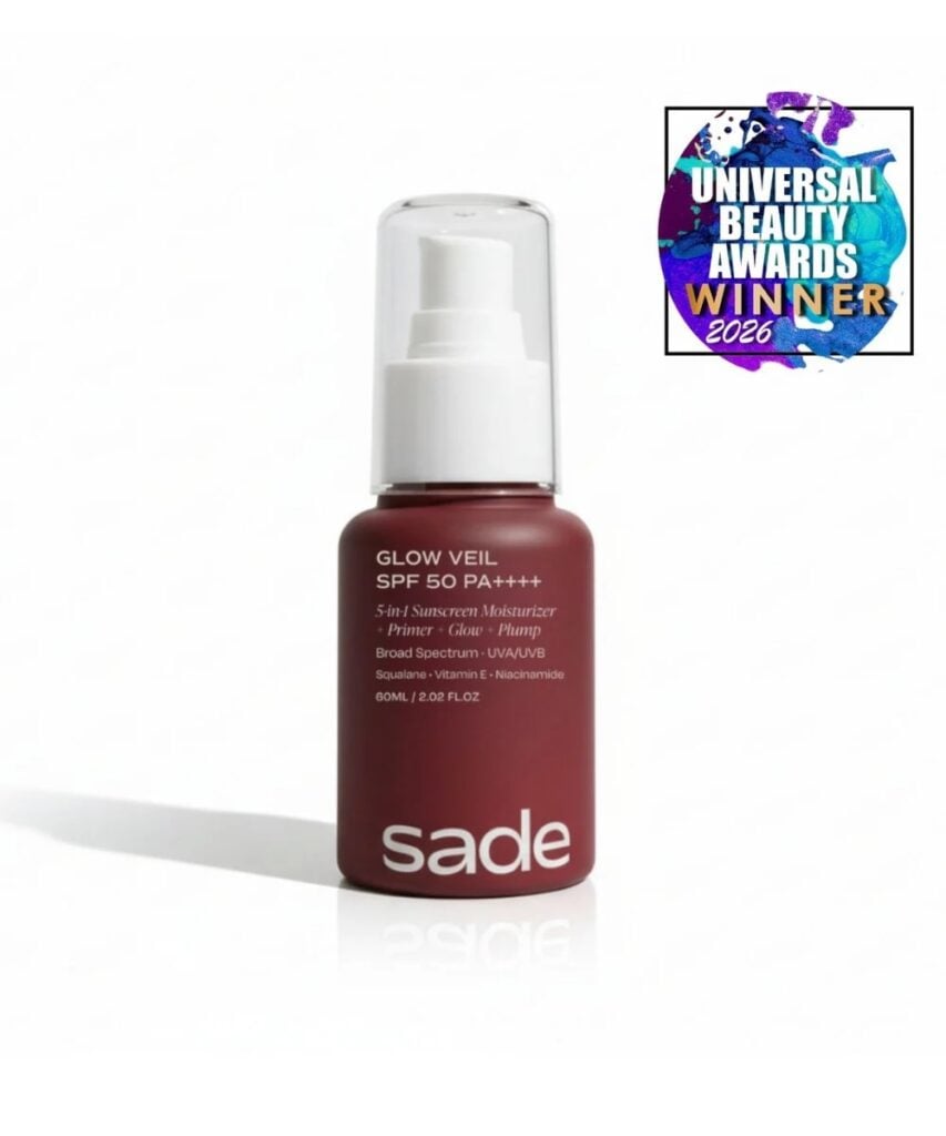 sade sustainable sunscreen in red bottle 