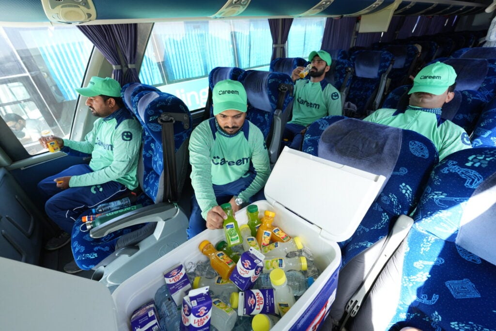 Careem drivers inside an air conditioned bus with refreshments