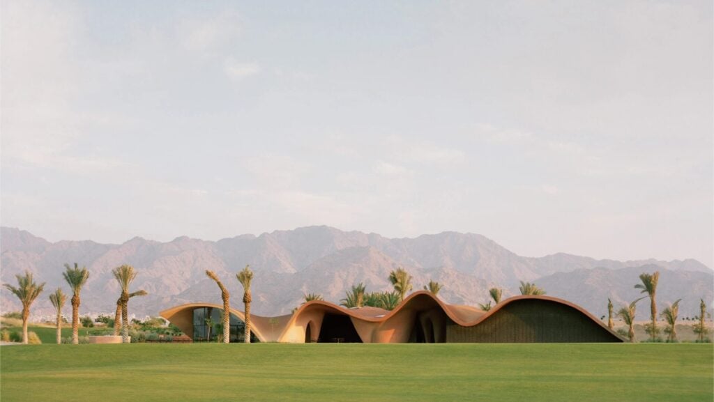 golf courses with mountains in the background 