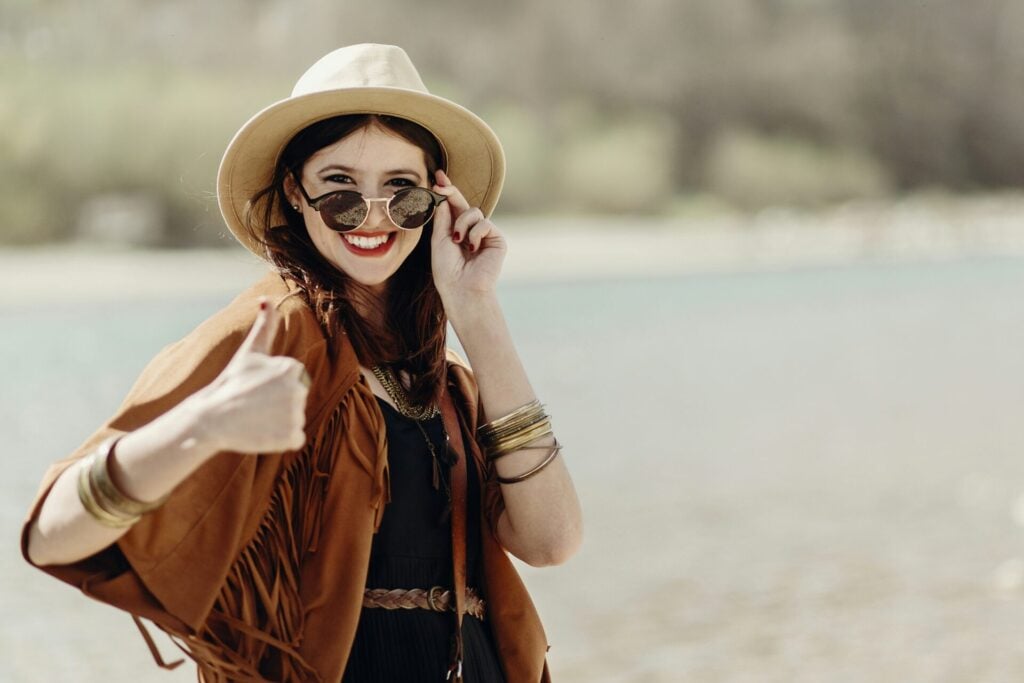 Lady with thumbs up on holiday