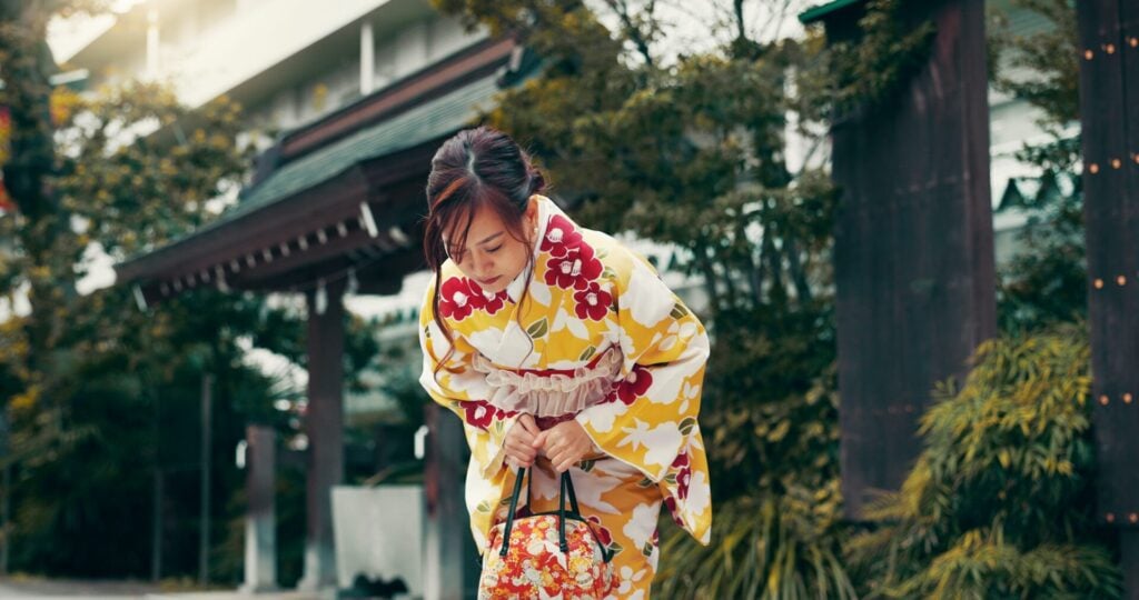 Lady bowing in a kimono