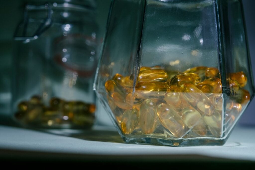 Supplements in glass containers