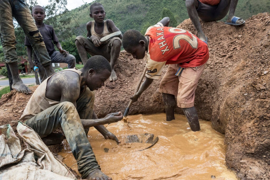 People at work in artisanal-illegal mines in Uganda where diamonds are sourced for engagement rings 