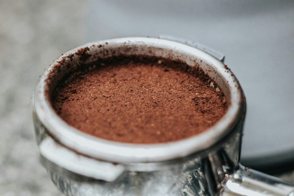 coffee grounds in coffee machine holder